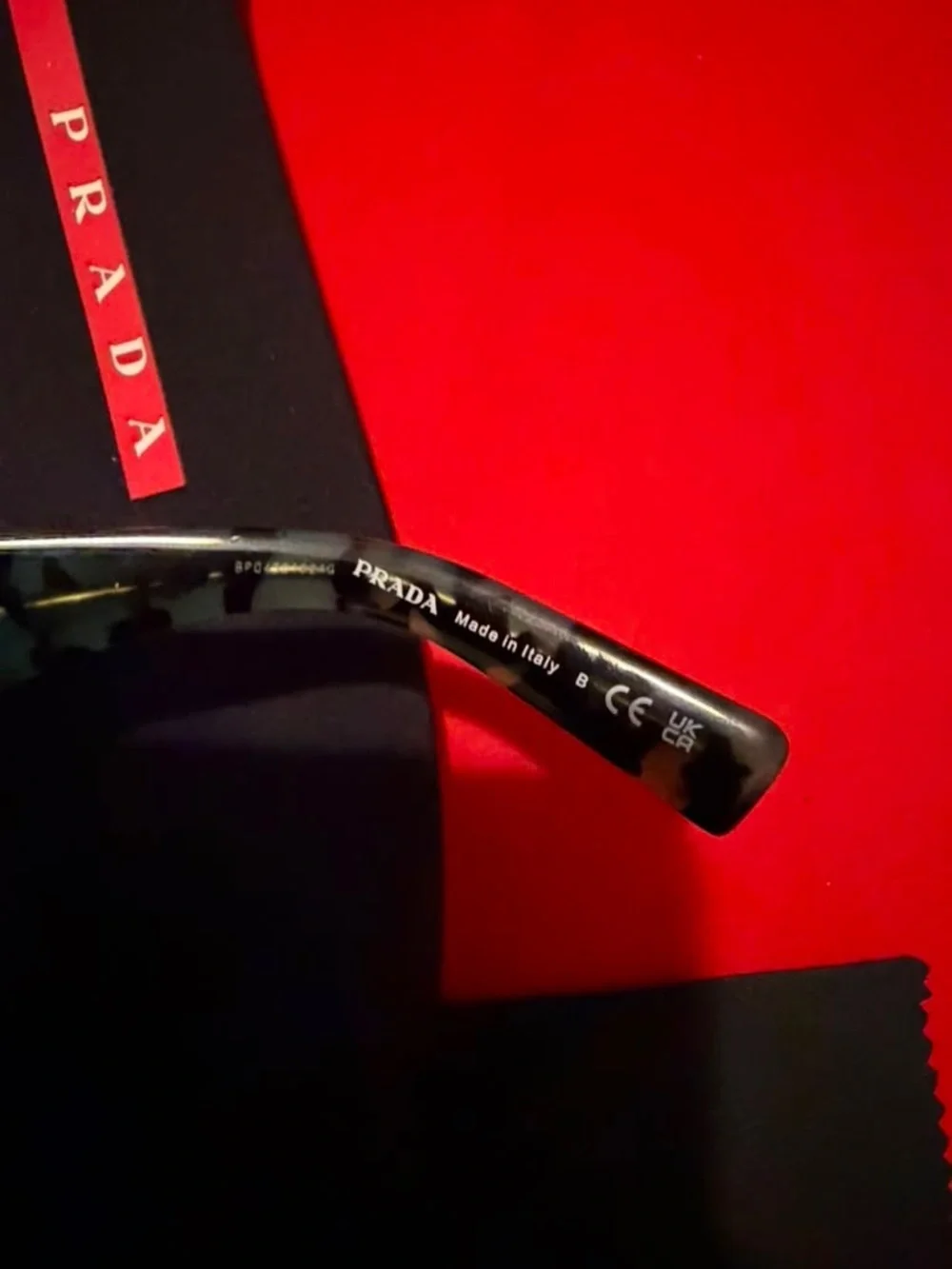 Prada Teal Tortoise Acetate Sunglasses with Gold Logo
